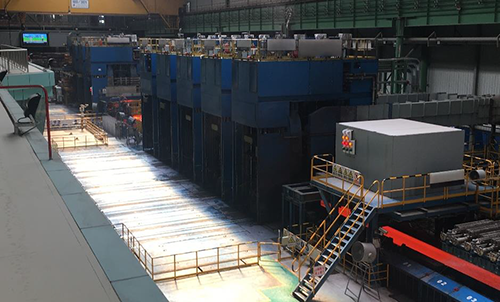 Continuous thin-slab caster and hot rolling mill established by SGJT